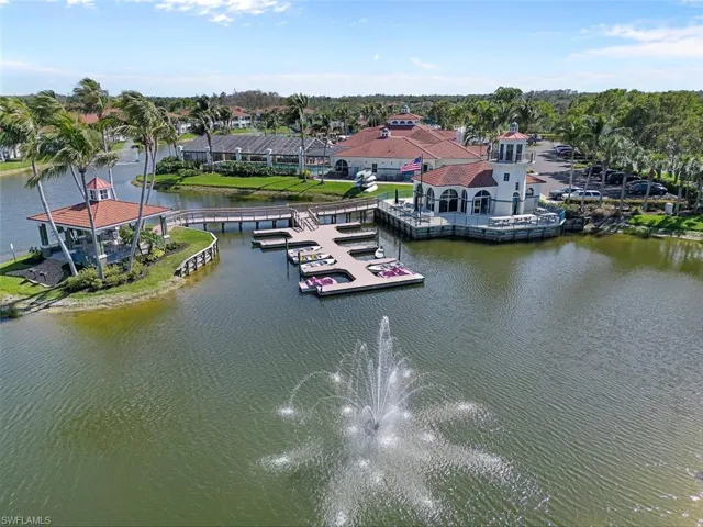 Aerial view with a residential view and a water view