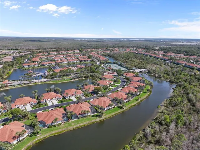 Bird's eye view featuring a water view and a residential view