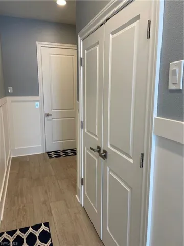 Huge storage under stairs; elevator in rear.