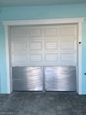 Flood barriers protect both front and back doors.