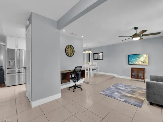 Office featuring light tile patterned floors, recessed lighting, and a ceiling fan