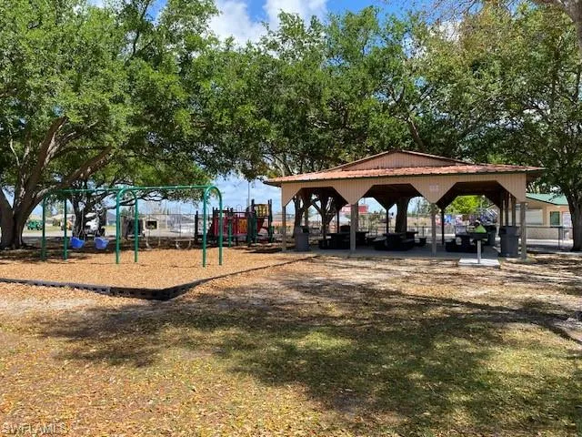 Strausser Park Playground & Picnic Shelter Area... Enjoy the park in sun or shade!