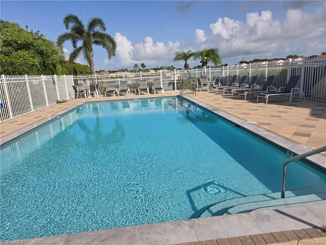 Community pool featuring a patio area