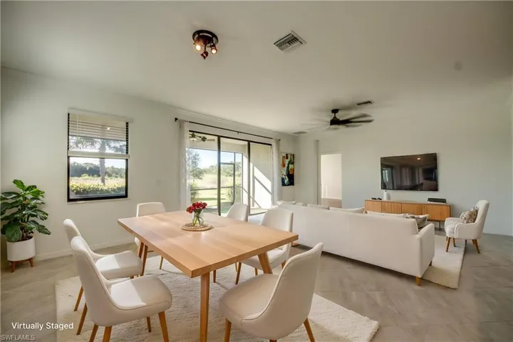 Dining space with ceiling fan