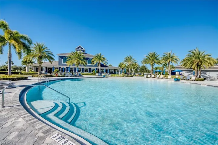 Community pool with a patio area