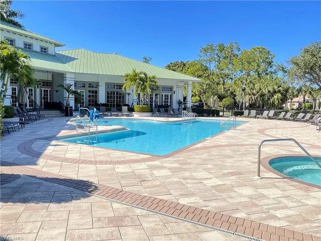 Resort style pool with hot tub