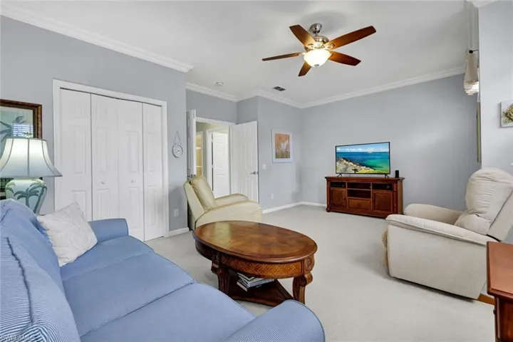 Wonderful crown molding and space in this oversized guest bedroom!