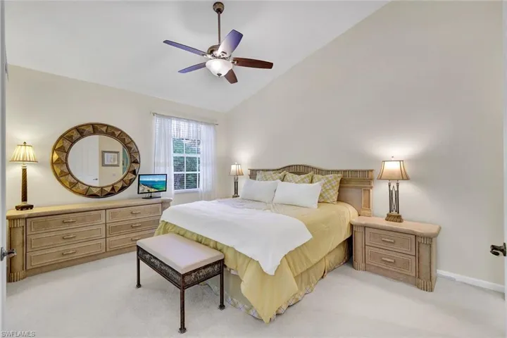 Welcome to the split floorplan with master bedroom towards the back of the home and lovely windows overlooking landscaped area! Wonderful vaulted ceiling making the bedroom feel even more spacious!