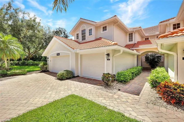 Lovely covered and landscaped entry!