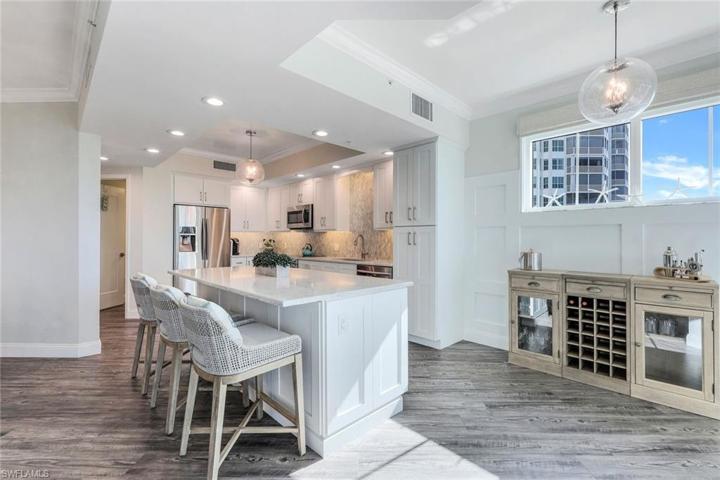 Large center island with seating, perfect for entertaining.