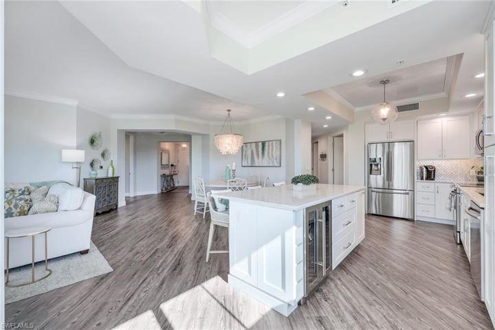 Large center island with a wine/beverage fridge.