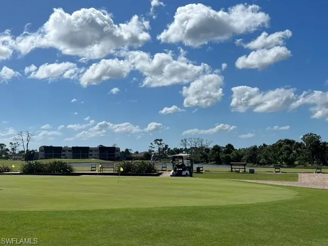 View of community featuring a lawn