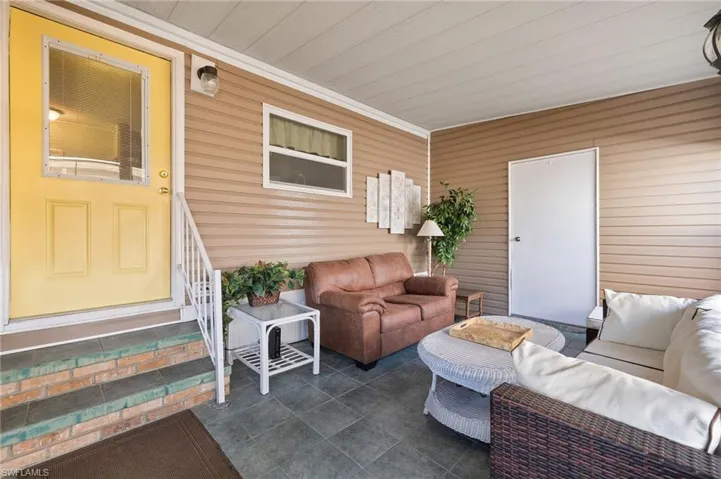 View of patio featuring a porch