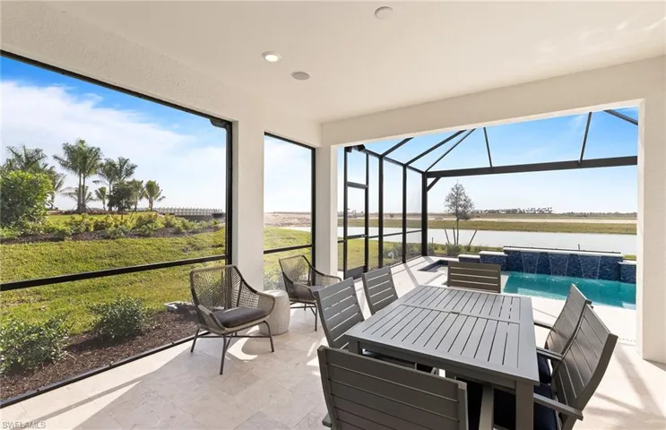 Covered lanai with custom pool - southern facing lanai on Lake Como