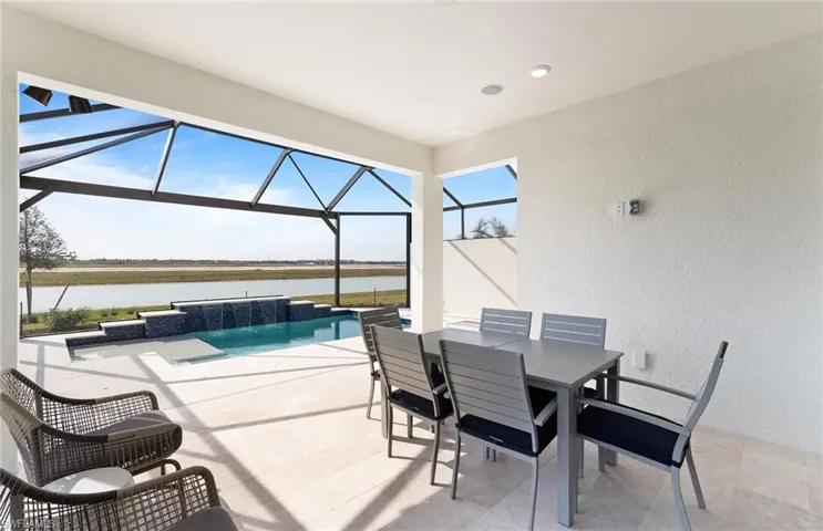 Covered lanai with custom pool - southern facing lanai on Lake Como