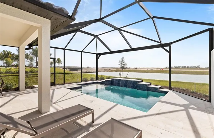 Covered lanai with custom pool - southern facing lanai on Lake Como