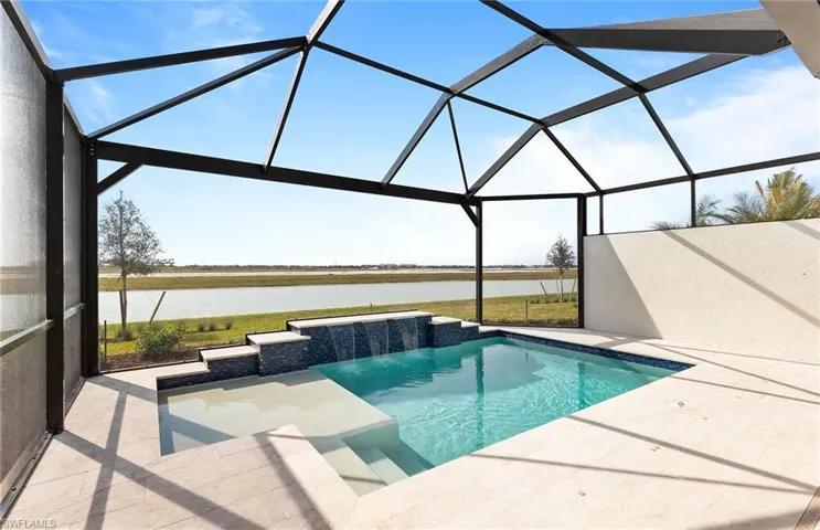 Covered lanai with custom pool - southern facing lanai on Lake Como