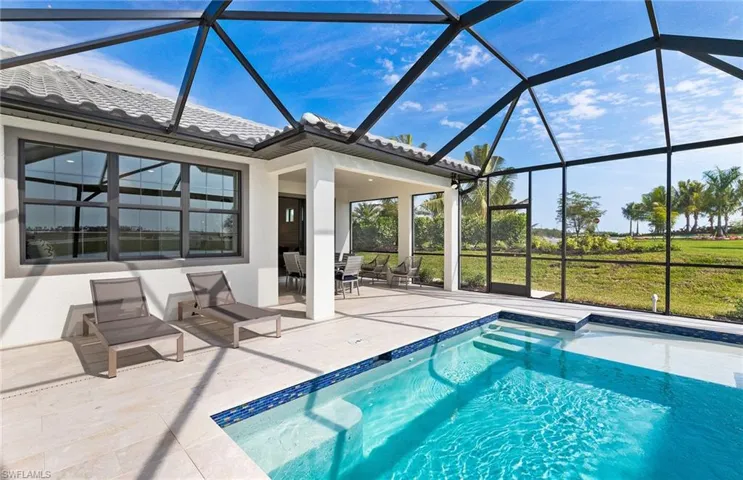 Covered lanai with custom pool - southern facing lanai on Lake Como