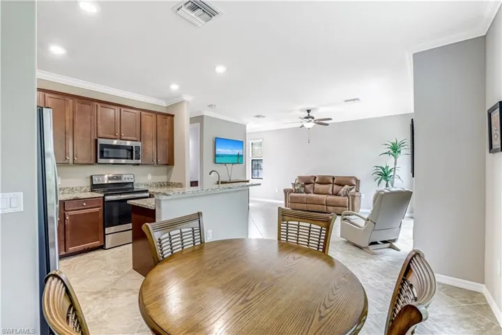Dining area with easy access to kitchen and living area