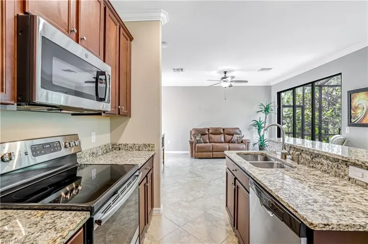 Kitchen featuring stainless steel appliances and granite countertops