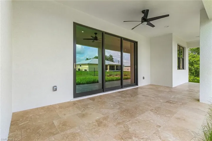 View of patio / terrace with ceiling fan