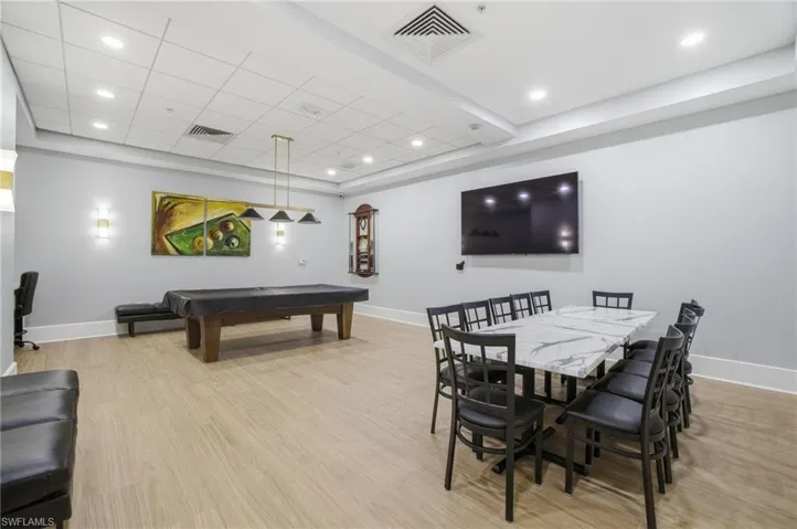 Recreation room featuring billiards and recessed lighting
