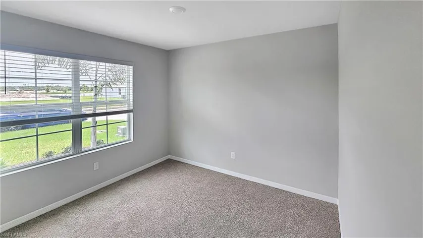 Spare room with carpet flooring