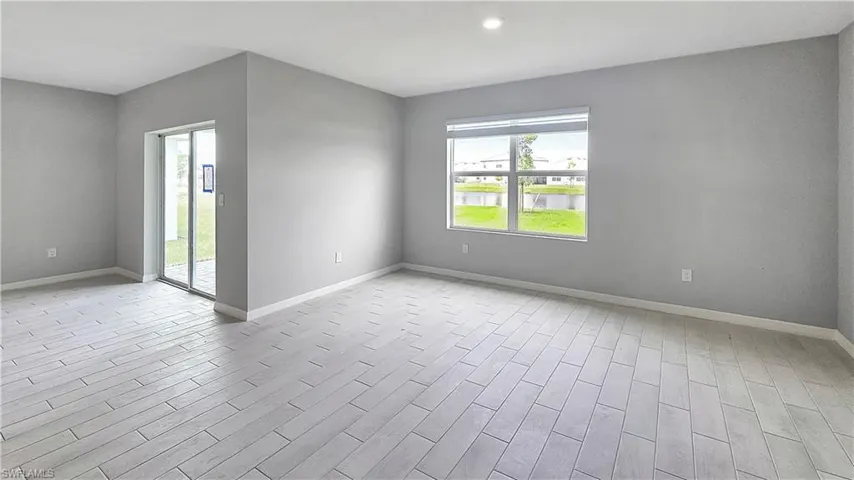 Spare room featuring plenty of natural light