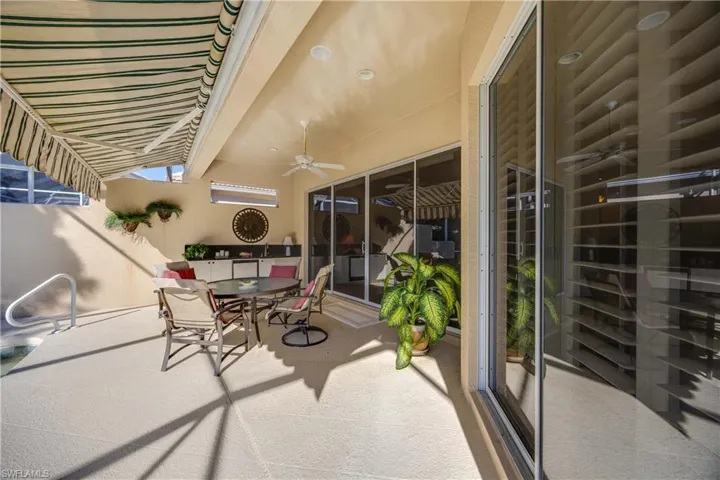 View of patio / terrace featuring outdoor dining area and ceiling fan