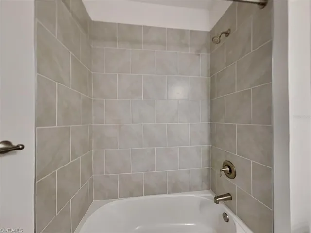 Picture of a previously completed home Full bath featuring shower / bathtub combination