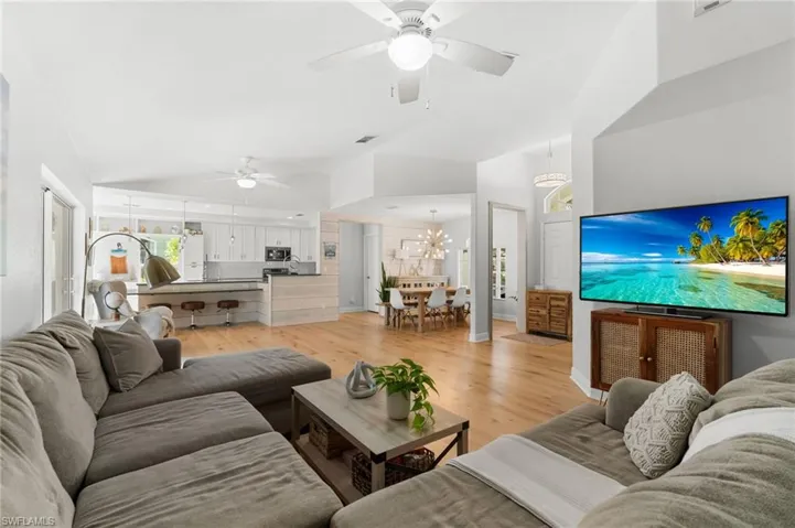 Living area with wood-finish flooring