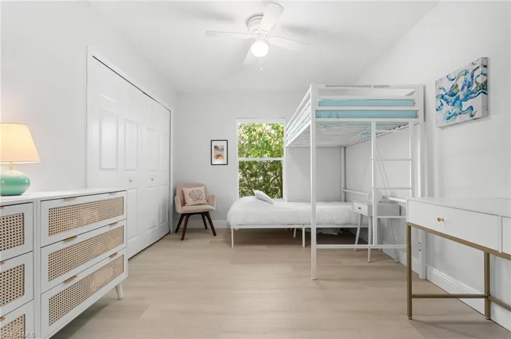 Bright interior room featuring light wood-finish flooring