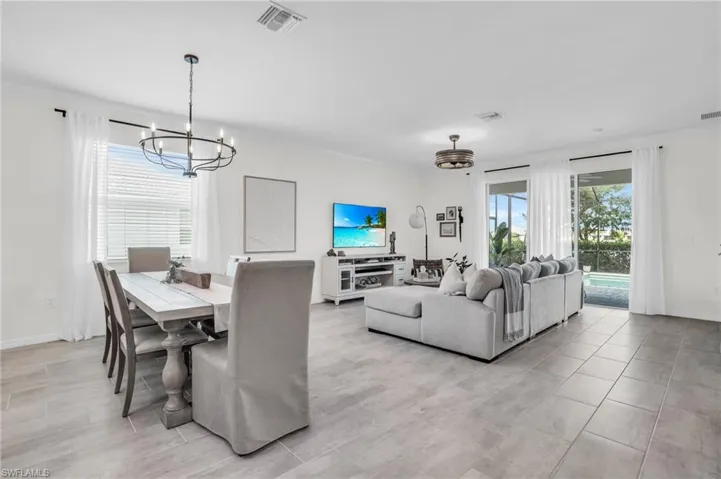 Living room featuring a notable chandelier