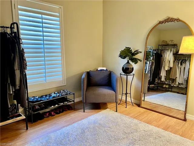 Living area with light wood-style flooring