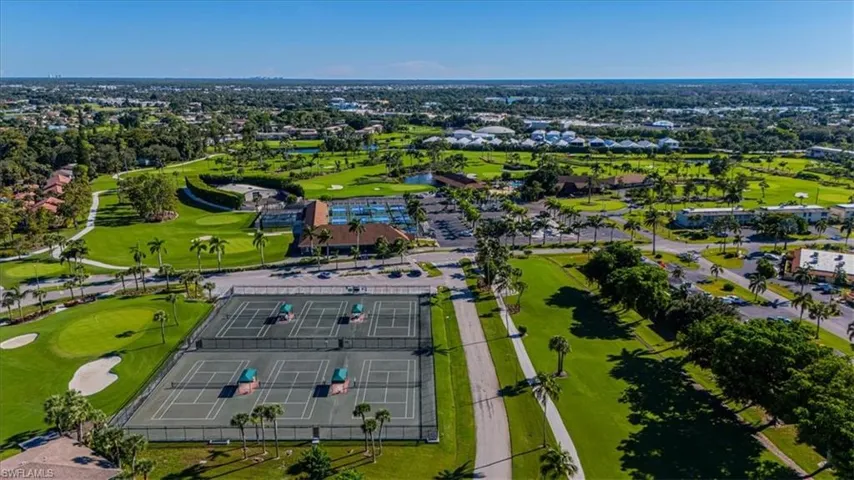 Aerial view of tennis courts, pickleball courts and golf course