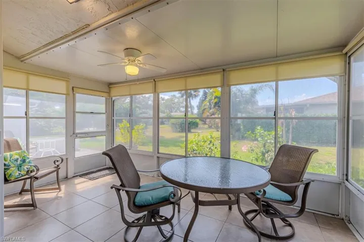 Lanai featuring tile floor, garden view