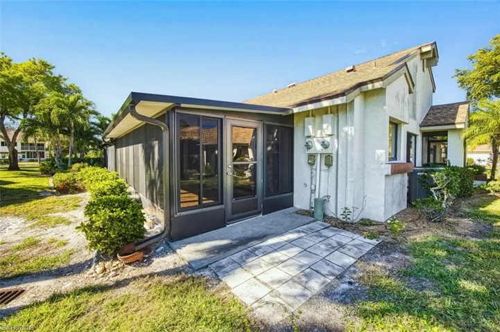 Back of house featuring a patio and stucco siding