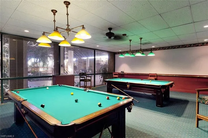Game room with billiards table, a drop ceiling, and recessed lighting
