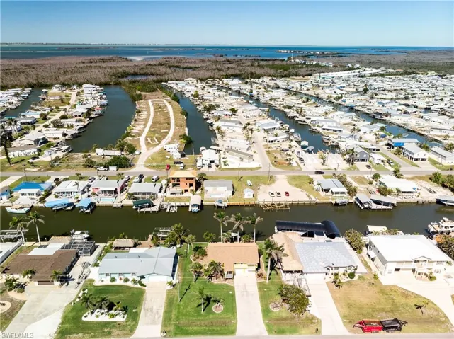 Aerial view with a residential view and a water view