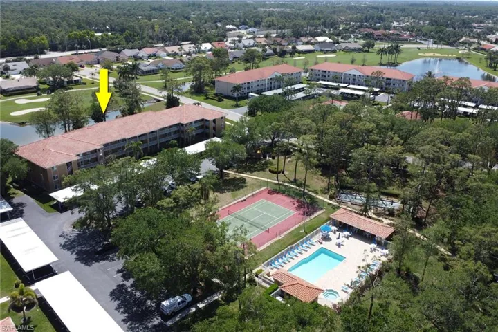 Birds eye view of property featuring a residential view and a water view