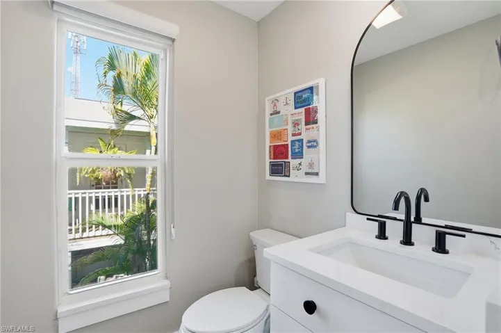 Bathroom with vanity and toilet - Virtually Edited Image