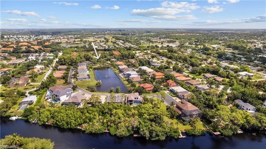 Drone / aerial view featuring a residential view and a water view