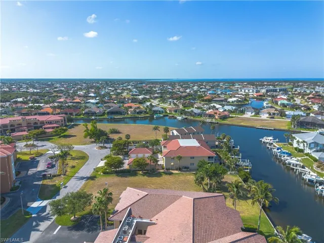 Aerial view of residential area with a large body of water
