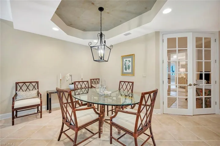 Dining Area and Doors to Den
