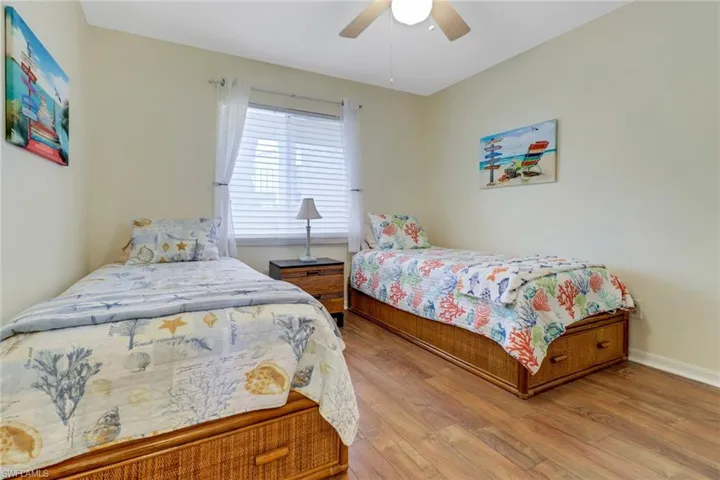 Guest Bedroom furnished with Twin Beds w storage, additionally there is a large closet