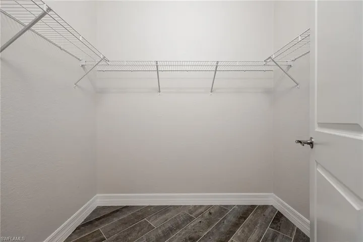 Walk-In Closet in Primary Bedroom