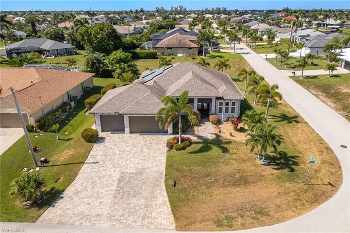 Beautiful Home with Tropical Landscaping & Solar Panels for Low Electric Bills