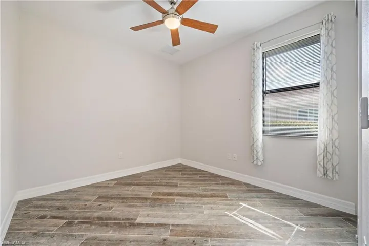 Second Bedroom with Wood-Look Tile Floors