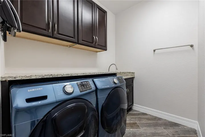 Laundry Room with Front Load Washer & Dryer & Laundry Tub