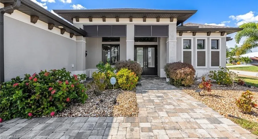 Welcoming Front Entry with Paver Pathway